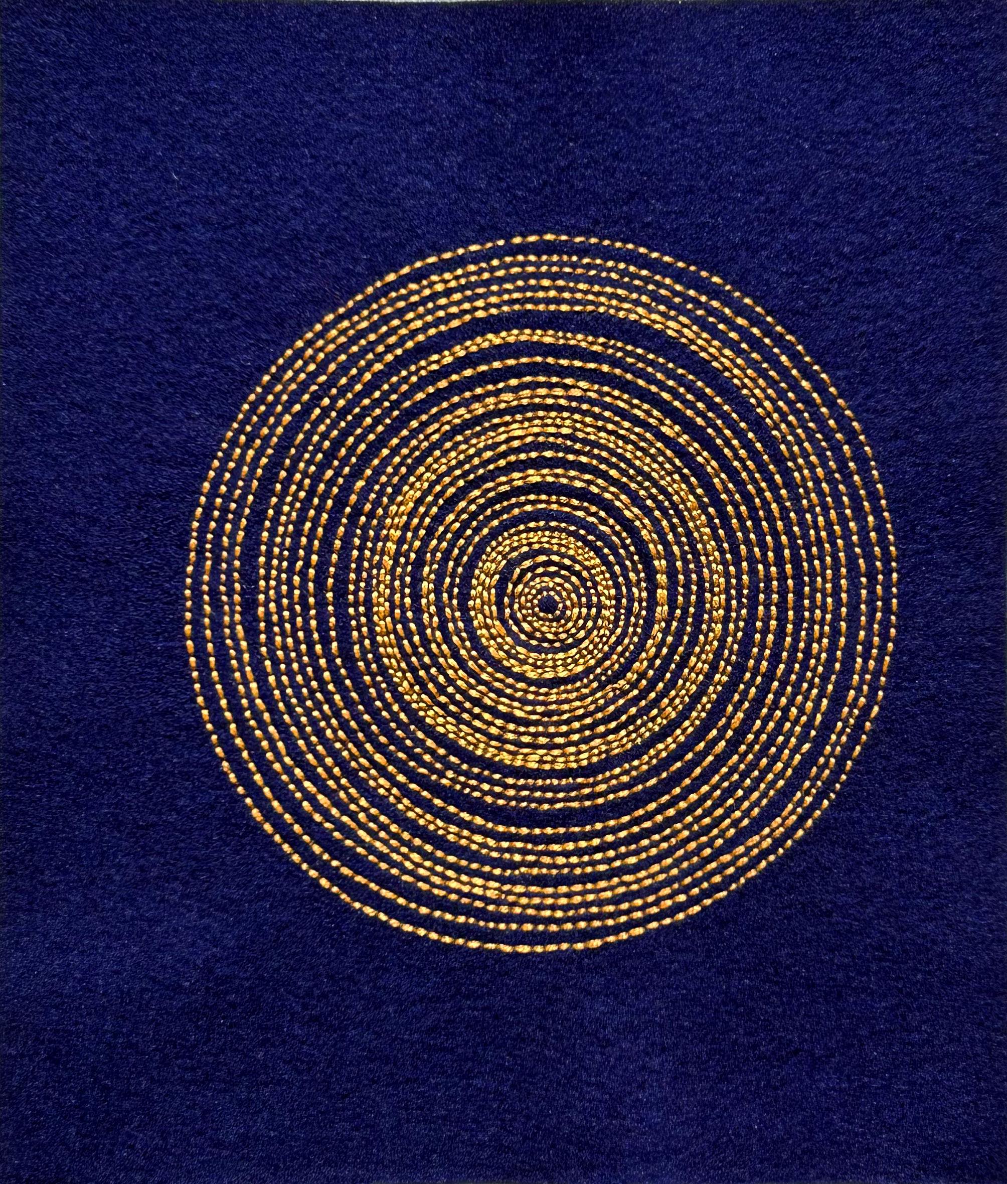 Photo of art Old Gold thread on navy blue felt